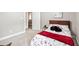 Inviting bedroom with plush carpeting, comfortable bed, and serene neutral color palette at 12551 Alcovy Rd, Covington, GA 30014