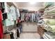 Walk-in closet features built in shelving and racks at 12551 Alcovy Rd, Covington, GA 30014