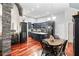 Charming kitchen with dark cabinets, quartz countertops, and an island at 12551 Alcovy Rd, Covington, GA 30014