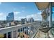 Balcony featuring city views, stylish seating, and an open space for outdoor enjoyment at 3324 Peachtree Ne Rd # 2808, Atlanta, GA 30326