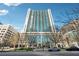 Stunning high-rise building exterior with modern architecture and ample parking at 3324 Peachtree Ne Rd # 2808, Atlanta, GA 30326