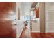 Stylish hallway with wood floors leading to a dining area with views of the city at 3324 Peachtree Ne Rd # 2808, Atlanta, GA 30326