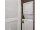 Convenient laundry area with a stacked washer and dryer unit at 3324 Peachtree Ne Rd # 2808, Atlanta, GA 30326