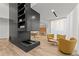 A lounge area features modern furnishings, including a fireplace and built-in shelving at 3324 Peachtree Ne Rd # 2808, Atlanta, GA 30326