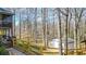 Picturesque backyard with fencing, a small shed, and mature trees offering privacy at 416 Delane Dr, Dallas, GA 30157
