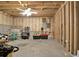 Unfinished basement area with exposed beams, electrical, and room for customization at 416 Delane Dr, Dallas, GA 30157