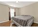 Bedroom featuring hardwood floors, neutral walls and plenty of natural light at 416 Delane Dr, Dallas, GA 30157