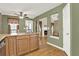 Open kitchen with peninsula island and view to living room at 416 Delane Dr, Dallas, GA 30157