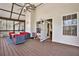 Spacious screened-in porch with outdoor seating, ceiling fan, and a view to the outdoors at 416 Delane Dr, Dallas, GA 30157