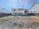Backyard featuring a patio, fire pit, and a fenced yard at 134 Edinburgh Dr, Canton, GA 30115