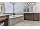 Bathroom features a soaking tub, dual sinks, and a glass-enclosed shower at 134 Edinburgh Dr, Canton, GA 30115