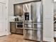 Close up of refrigerator, showing a modern stainless steel refrigerator in an updated kitchen at 134 Edinburgh Dr, Canton, GA 30115