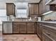 Functional kitchen with stainless steel appliances, granite countertops, and undermount lighting at 134 Edinburgh Dr, Canton, GA 30115