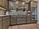 Well-equipped kitchen with stainless steel appliances, sleek cabinetry, and ample counter space at 134 Edinburgh Dr, Canton, GA 30115