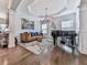 Formal living room with hardwood floors, modern lighting, and stylish decor at 134 Edinburgh Dr, Canton, GA 30115