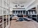 Spacious living room featuring a flat screen TV, ceiling fan, and plush seating at 134 Edinburgh Dr, Canton, GA 30115