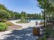 A beautiful walking area is surrounded by the Harmony Lake pool area at 134 Edinburgh Dr, Canton, GA 30115