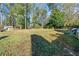 Large backyard with plenty of space for recreation and outdoor activities at 210 Timber Laurel Ct, Lawrenceville, GA 30043