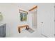 Bright bathroom featuring a stall shower, decorative wooden bench, and a vanity with countertop at 210 Timber Laurel Ct, Lawrenceville, GA 30043