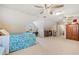 Large bedroom with multiple closets, study area, and carpet flooring at 210 Timber Laurel Ct, Lawrenceville, GA 30043