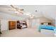 Spacious bedroom with multiple beds, natural light, and ceiling fans for a comfortable living space at 210 Timber Laurel Ct, Lawrenceville, GA 30043