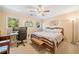 Comfortable bedroom with a workspace, ample natural light, and a relaxing atmosphere at 210 Timber Laurel Ct, Lawrenceville, GA 30043