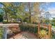 Charming front entrance with a welcoming sign and well-manicured landscaping at 210 Timber Laurel Ct, Lawrenceville, GA 30043