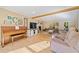 This is a living room with wood floors, natural light and a fireplace at 210 Timber Laurel Ct, Lawrenceville, GA 30043