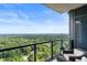 Relaxing balcony offers amazing treetop views, creating a peaceful outdoor retreat with cozy seating at 3630 Peachtree Ne Rd # 2009, Atlanta, GA 30326