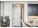 Inviting entryway near kitchen featuring a stylish bar cart and granite countertop at 3630 Peachtree Ne Rd # 2009, Atlanta, GA 30326