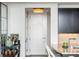 Inviting entryway near kitchen featuring a stylish bar cart and granite countertop at 3630 Peachtree Ne Rd # 2009, Atlanta, GA 30326