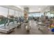 Well-equipped fitness center with treadmills, weights, and expansive windows offering scenic views at 3630 Peachtree Ne Rd # 2009, Atlanta, GA 30326