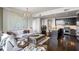 Spacious living room featuring an open layout that connects to the gourmet kitchen and dining areas at 3630 Peachtree Ne Rd # 2009, Atlanta, GA 30326