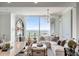 Bright living room featuring floor-to-ceiling windows offering stunning views, plus modern decor at 3630 Peachtree Ne Rd # 2009, Atlanta, GA 30326