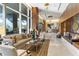 Elegant lobby with modern seating, stylish decor, and ample natural light through large windows at 3630 Peachtree Ne Rd # 2009, Atlanta, GA 30326