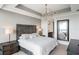 Relaxing main bedroom bathed in natural light, features modern lighting, and stylish decor at 3630 Peachtree Ne Rd # 2009, Atlanta, GA 30326