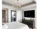 Comfortable main bedroom complemented by a sleek ensuite bathroom and custom storage for ultimate relaxation at 3630 Peachtree Ne Rd # 2009, Atlanta, GA 30326