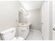 Clean bathroom with white vanity, tile floors, and a bright light fixture at 109 Willowick Dr # 109, Lithonia, GA 30038