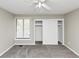 Spacious bedroom with ceiling fan and a large closet at 109 Willowick Dr # 109, Lithonia, GA 30038