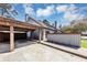 Exterior features a spacious carport with wood support beams at 109 Willowick Dr # 109, Lithonia, GA 30038