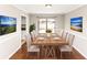 Dining room featuring wood floors, slider to outdoor area and stylish decor at 109 Willowick Dr # 109, Lithonia, GA 30038