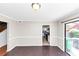 Bright dining room with wood floors and slider to outdoor area at 109 Willowick Dr # 109, Lithonia, GA 30038