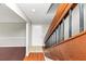 Inviting foyer featuring wood floors, staircase, and ample natural light at 109 Willowick Dr # 109, Lithonia, GA 30038