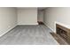 Living room with neutral paint, carpet, and a non-operable fireplace at 109 Willowick Dr # 109, Lithonia, GA 30038