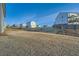 Large backyard with tiered landscaping, providing ample space for outdoor activities at 123 Ledgemont Way, Acworth, GA 30101