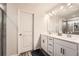 Modern bathroom features double sinks, granite counters, and a glass-enclosed shower at 123 Ledgemont Way, Acworth, GA 30101