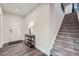 Welcoming foyer with hardwood floors and a staircase leading to the second level at 123 Ledgemont Way, Acworth, GA 30101