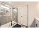 Contemporary shower with tile surround and glass door at 123 Ledgemont Way, Acworth, GA 30101