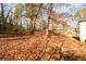 Large backyard with a treeline and a view of the house at 2107 Penrose Dr, Atlanta, GA 30344