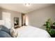 Bright bedroom with a large window, gray walls, and stylish decor at 2107 Penrose Dr, Atlanta, GA 30344